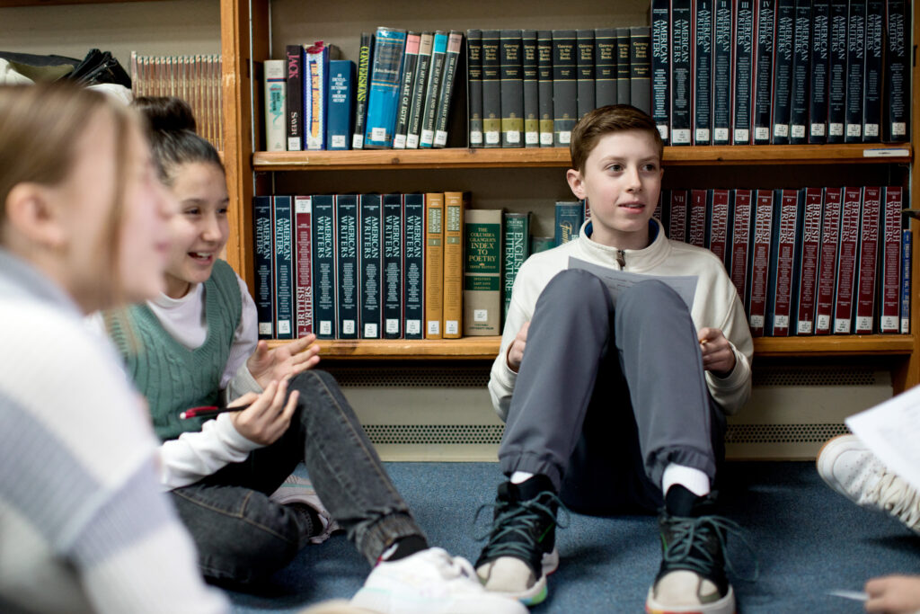 a middle school boy in a library 